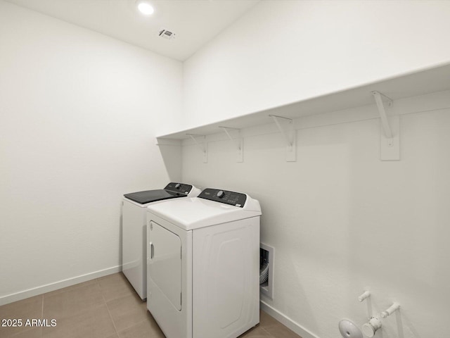 laundry area featuring laundry area, visible vents, baseboards, separate washer and dryer, and recessed lighting