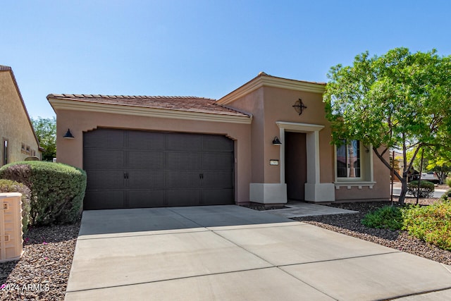 view of front of home with a garage