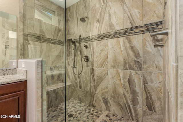 bathroom with vanity and an enclosed shower