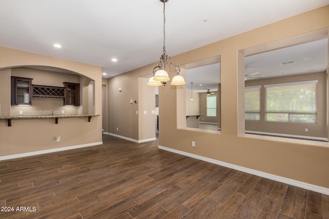 interior space featuring dark hardwood / wood-style floors and ceiling fan