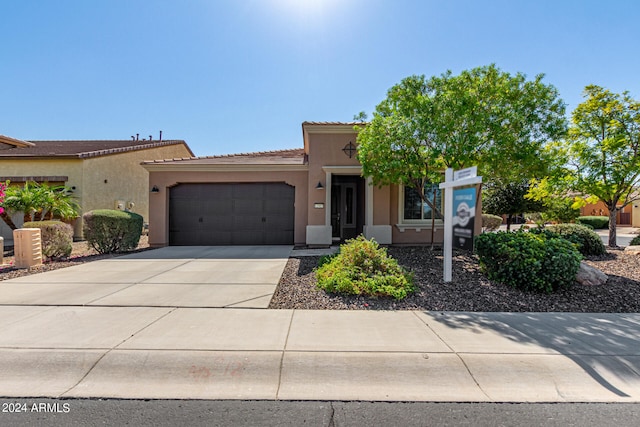 view of front of home with a garage