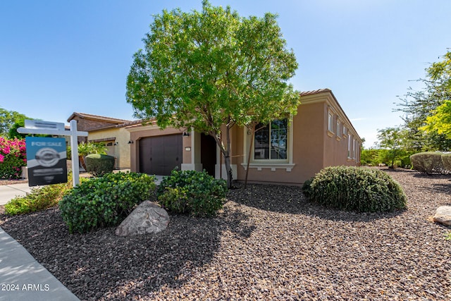 view of front of house with a garage