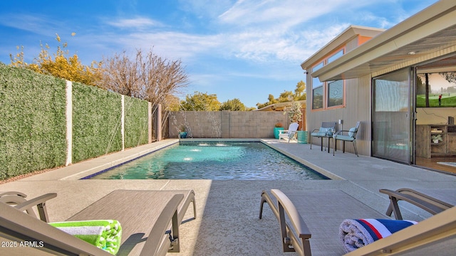 view of pool featuring a patio and pool water feature