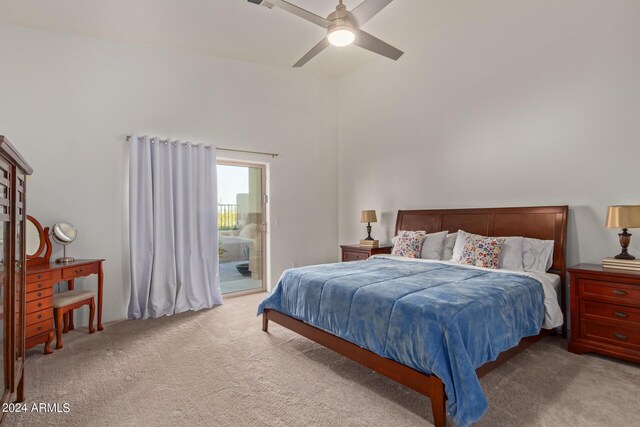 carpeted bedroom with access to exterior and ceiling fan