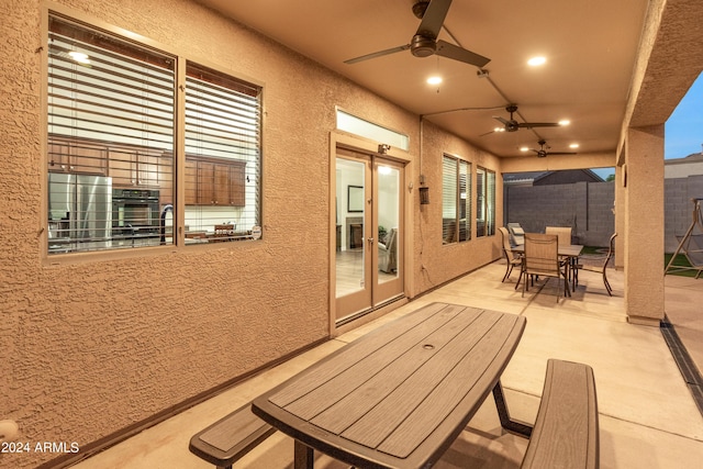 view of patio / terrace with ceiling fan