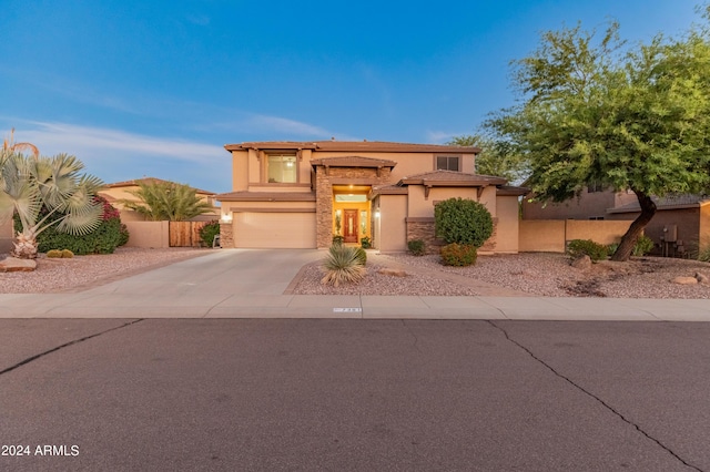 view of front of property featuring a garage