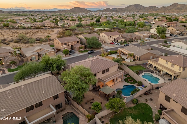 aerial view at dusk with a mountain view