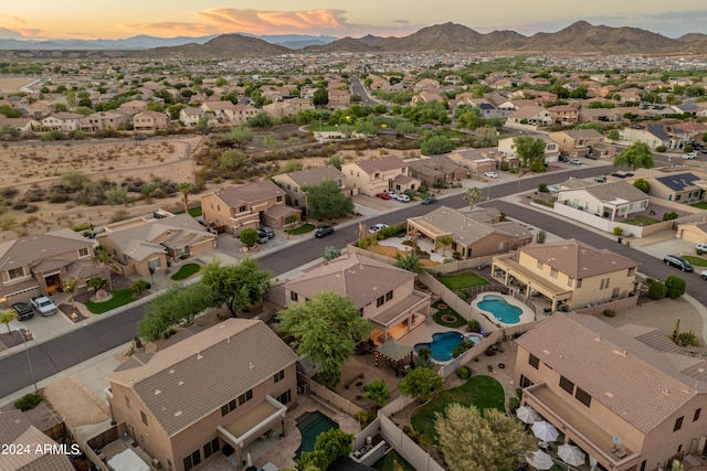 aerial view at dusk with a mountain view