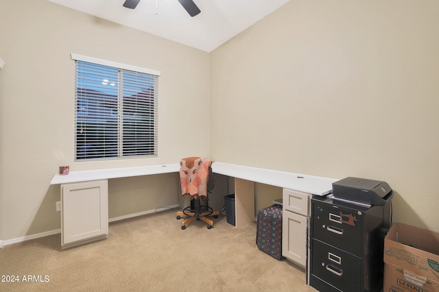 carpeted office with ceiling fan