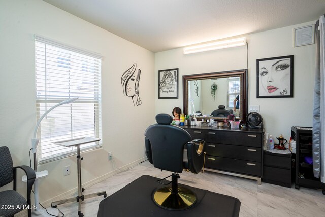 16425 W Latham St, Goodyear, AZ 85338 - office featuring healthy amount of natural light, light marble finish flooring, and baseboards