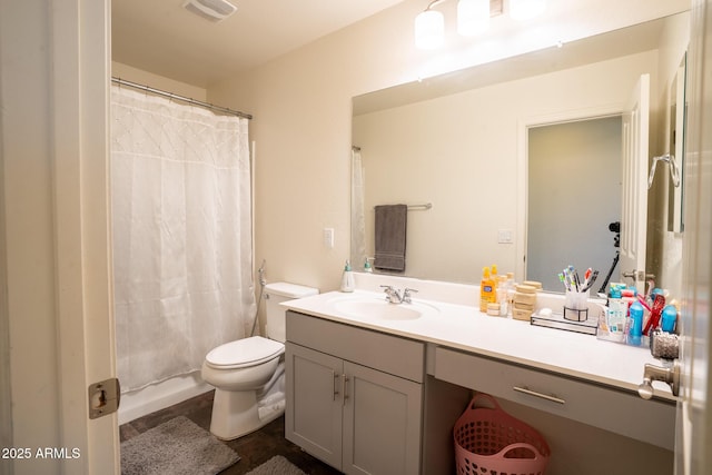 16425 W Latham St, Goodyear, AZ 85338 - bathroom featuring vanity, toilet, and a shower with shower curtain