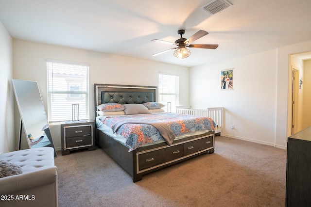 16425 W Latham St, Goodyear, AZ 85338 - bedroom featuring light carpet, ceiling fan, and baseboards