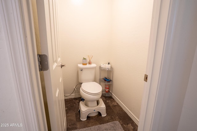 16425 W Latham St, Goodyear, AZ 85338 - bathroom featuring toilet and baseboards