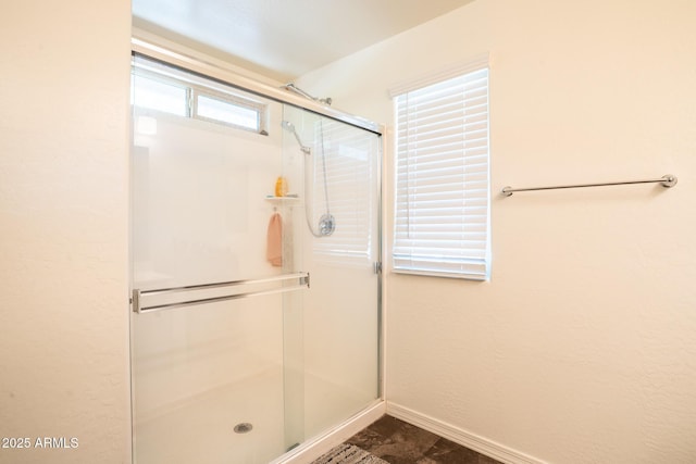 16425 W Latham St, Goodyear, AZ 85338 - full bath with a stall shower and baseboards