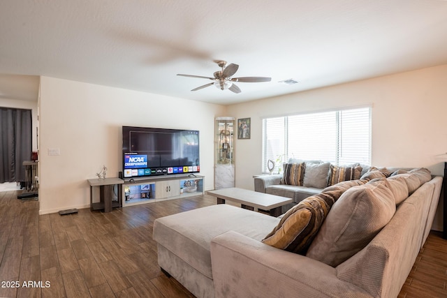 16425 W Latham St, Goodyear, AZ 85338 - living room featuring a ceiling fan and wood finished floors