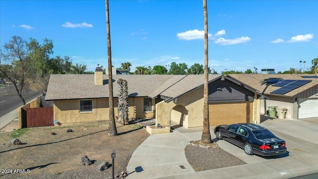 ranch-style home with a garage