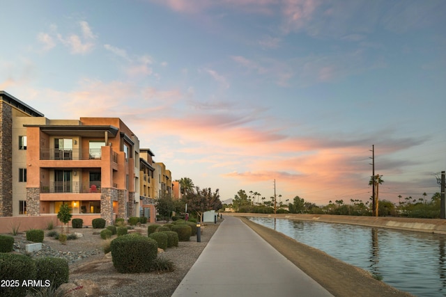 view of community featuring a water view