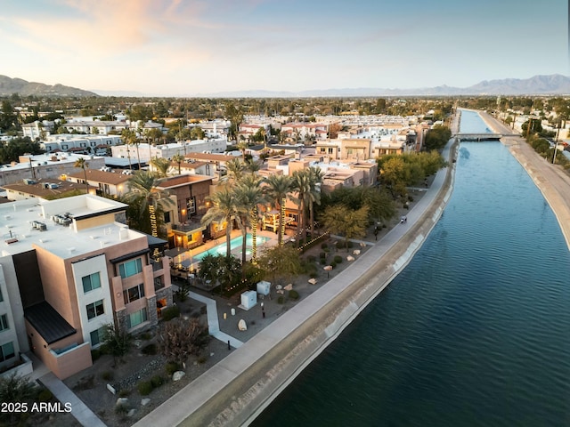 bird's eye view featuring a water and mountain view