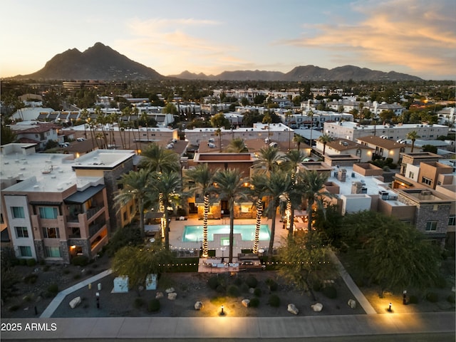 aerial view at dusk with a mountain view