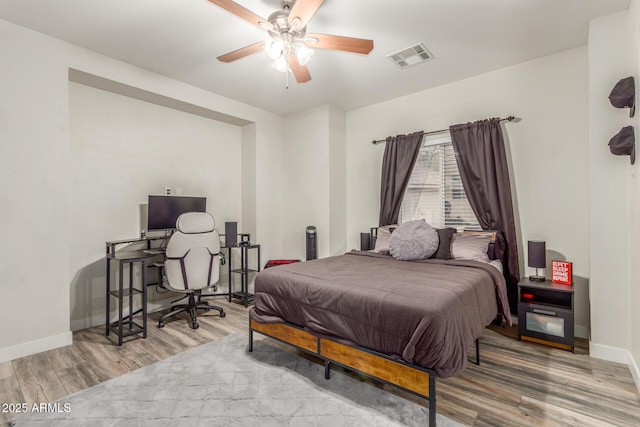 4446 W Kimberly Way, Glendale, AZ 85308 - bedroom featuring wood finished floors, baseboards, and ceiling fan