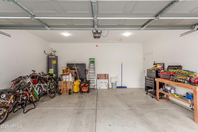 4446 W Kimberly Way, Glendale, AZ 85308 - garage featuring water heater and a garage door opener
