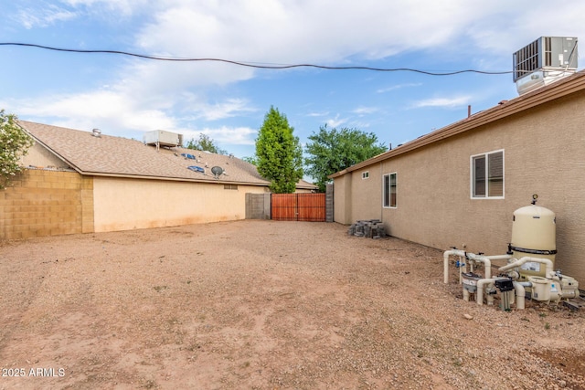 4446 W Kimberly Way, Glendale, AZ 85308 - view of yard featuring central air condition unit and a gate