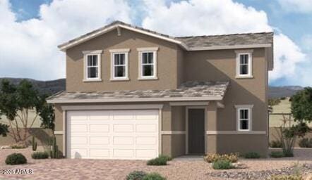 traditional-style home with a garage, driveway, and stucco siding