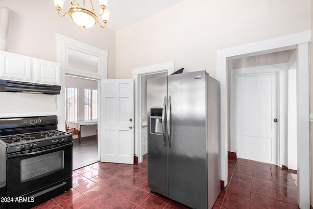 kitchen with a notable chandelier, white cabinets, stainless steel fridge with ice dispenser, black gas range, and dark tile patterned flooring