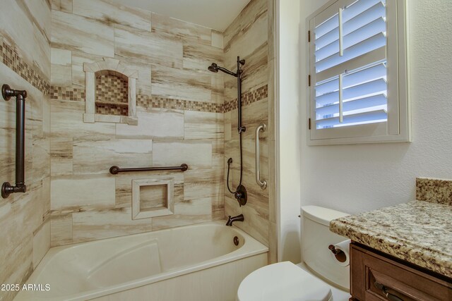 bathroom with toilet, shower / bath combination, and vanity