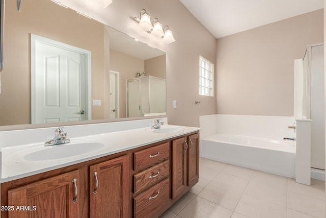 bathroom featuring vanity, shower with separate bathtub, and tile patterned floors