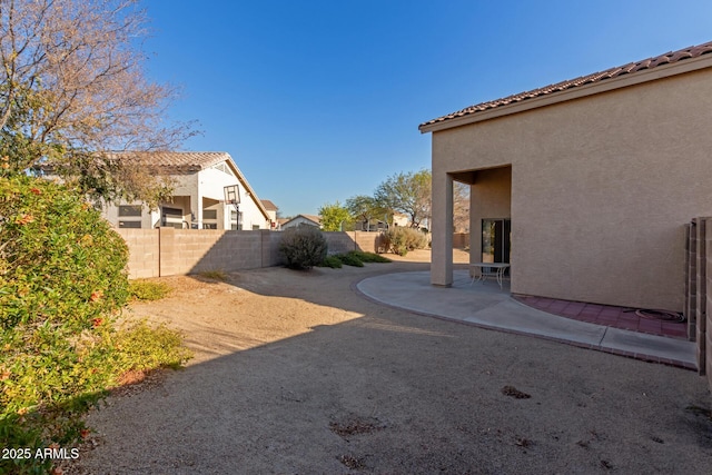 view of yard with a patio area