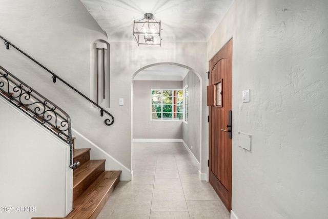 foyer with light tile patterned flooring