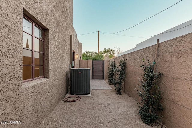 view of yard with central air condition unit