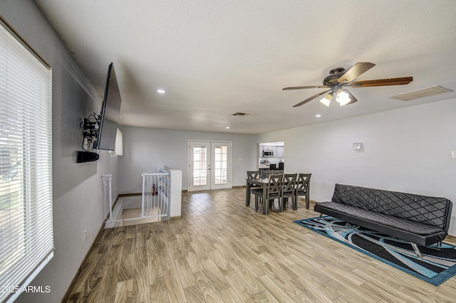 4162 W Sierra St, Phoenix, AZ 85029 - living area featuring wood finished floors, ceiling fan, french doors, baseboards, and recessed lighting