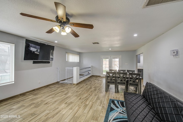 4162 W Sierra St, Phoenix, AZ 85029 - living area featuring light wood-style flooring, a ceiling fan, recessed lighting, a textured ceiling, and baseboards