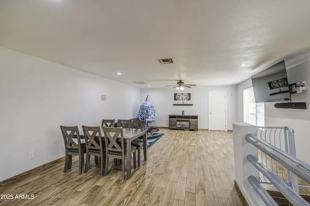 4162 W Sierra St, Phoenix, AZ 85029 - dining room featuring light wood finished floors, a ceiling fan, recessed lighting, and a textured ceiling