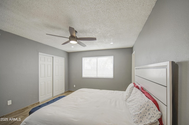 4162 W Sierra St, Phoenix, AZ 85029 - bedroom featuring wood finished floors, ceiling fan, a textured ceiling, and a closet