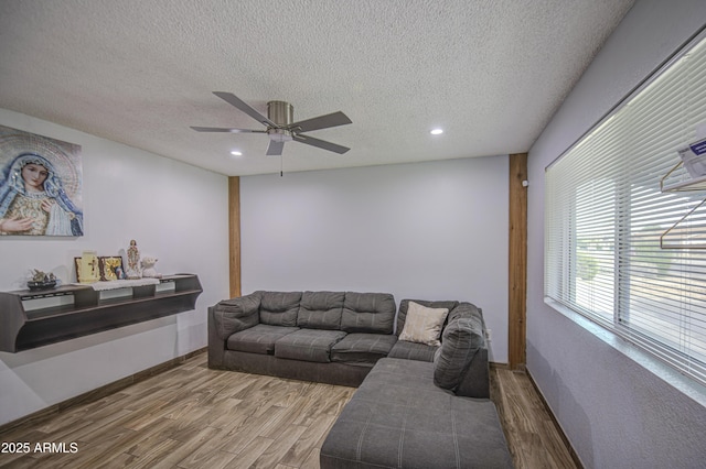 4162 W Sierra St, Phoenix, AZ 85029 - living room featuring wood finished floors, a textured ceiling, recessed lighting, and a ceiling fan
