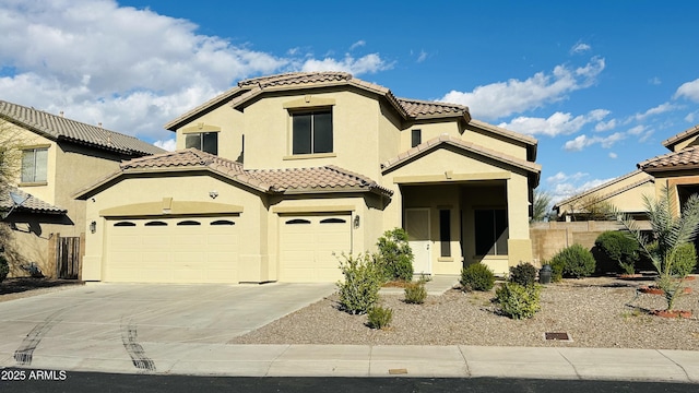7511 S 45th Dr, Laveen, AZ 85339 - mediterranean / spanish home featuring stucco siding, concrete driveway, and a tile roof