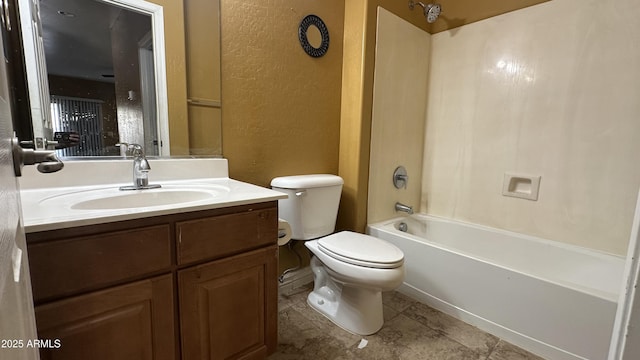 7511 S 45th Dr, Laveen, AZ 85339 - full bathroom featuring toilet,  shower combination, vanity, and a textured wall