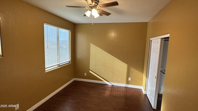7511 S 45th Dr, Laveen, AZ 85339 - spare room featuring plenty of natural light, wood finished floors, baseboards, and ceiling fan