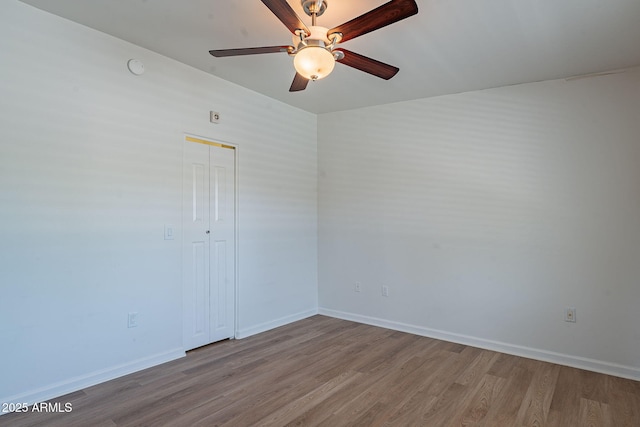 1219 E Colter St Unit 8, Phoenix, AZ 85014 - unfurnished room featuring ceiling fan, wood finished floors, and baseboards
