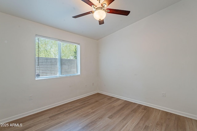 1219 E Colter St Unit 8, Phoenix, AZ 85014 - spare room featuring light wood-type flooring, baseboards, and a ceiling fan