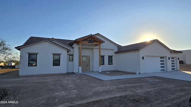 view of front of home with a garage