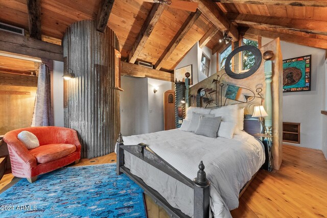 bedroom with hardwood / wood-style floors, vaulted ceiling with beams, and wooden ceiling