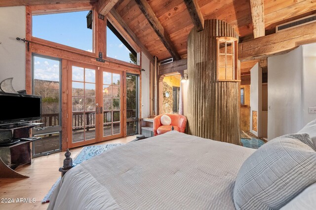 bedroom featuring french doors, wood ceiling, access to outside, beam ceiling, and light hardwood / wood-style flooring