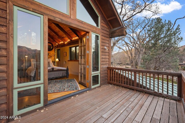 wooden terrace featuring a mountain view