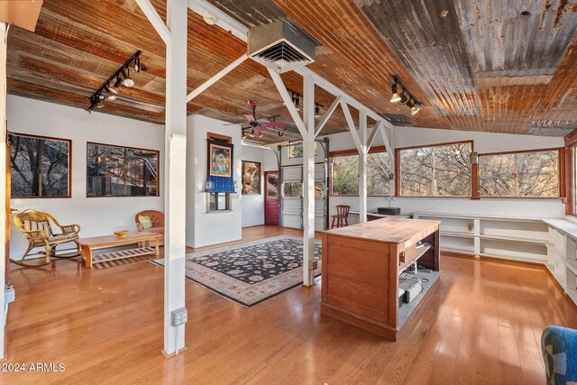 office area with light wood-type flooring, track lighting, wood ceiling, ceiling fan, and lofted ceiling