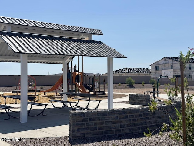 26406 N 77th Dr, Peoria, AZ 85383 - view of patio / terrace featuring fence and playground community