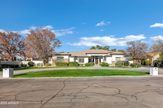 view of front of home with a front yard